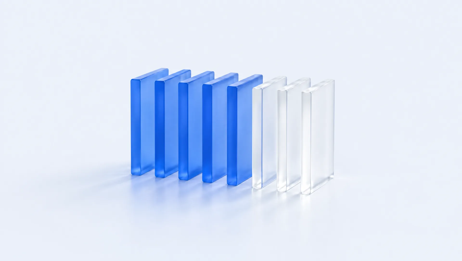 Eight frosted-glass slabs in a row, five tinted blue