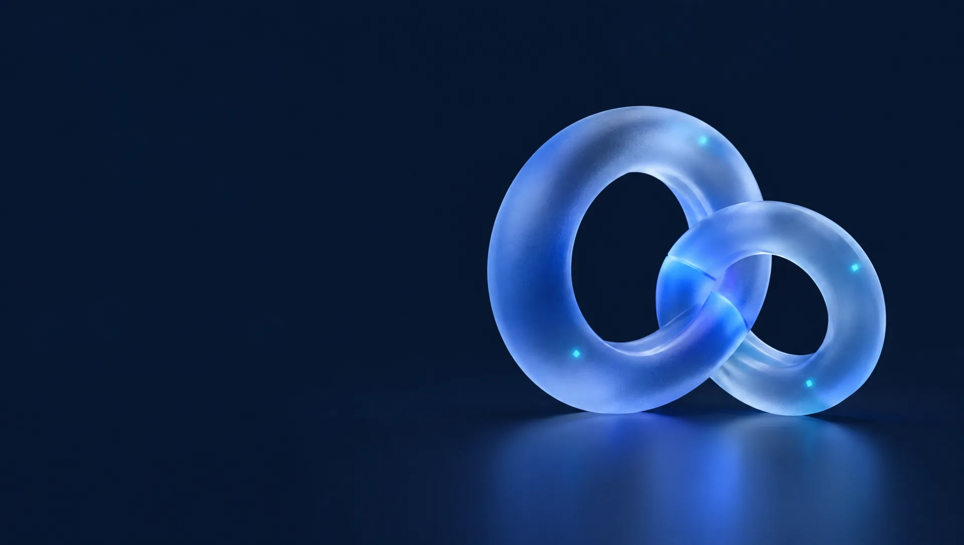 Two interlocking glass rings joined at a glowing blue seam